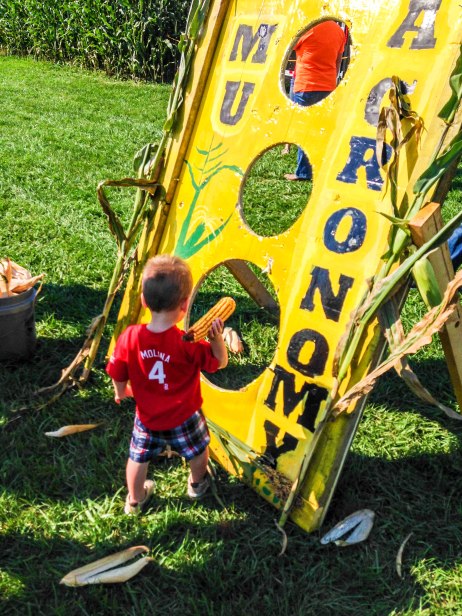 Young agronomists learn about Missouri crops while playing corn hole for sweet prizes